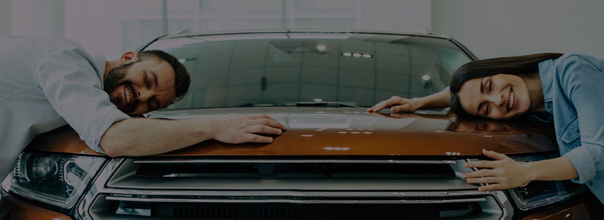 couple with new car